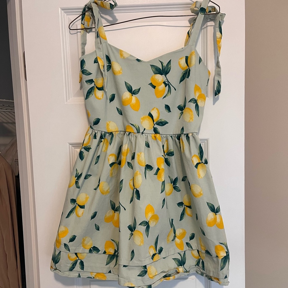 Lemon dress from Francesca’s boutique. Worn once. So cute on!
